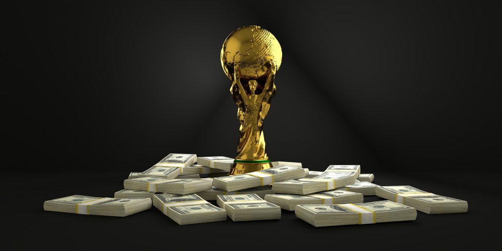 taça_da_copa_do_mundo_sobre_maços_de_dinheiro Taça da copa do mundo sobre maços de dinheiro